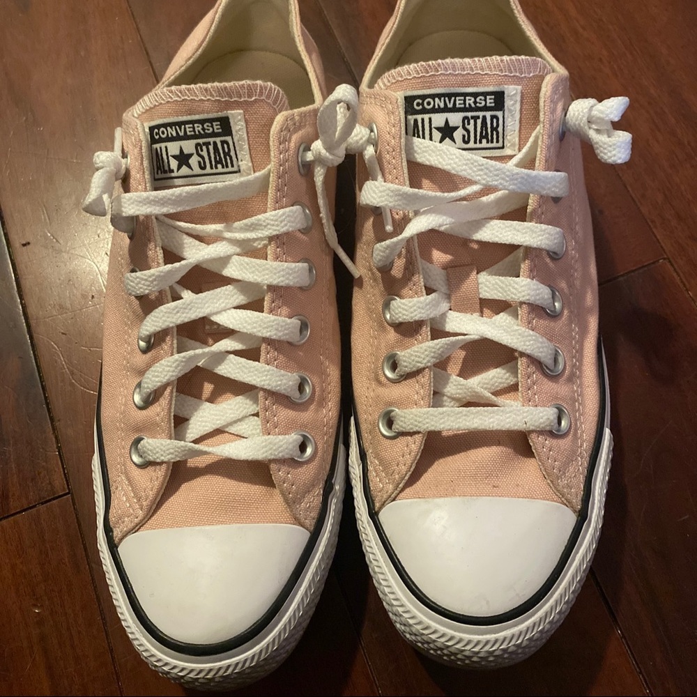 Converse size 9.5 women’s All Stars. Only worn twice!